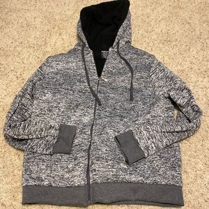 Gray and white Starting Point Furling Fleece hooded jacket with hood.